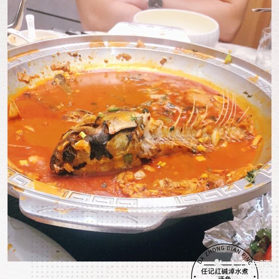 任记红碱淖水煮活鱼店