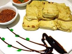铁板包浆豆腐-朱家花园食府(顺城王府井店)