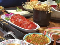-老牌坊云南鱼豆花火锅(哈西万达店)