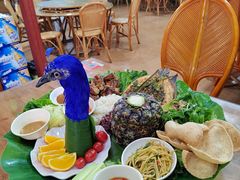 -沐毫傣泐云南菜孔雀宴•手抓饭傣味烧烤(曼听公园店)
