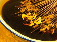 -拈签一笑黄牛肉辣卤串串