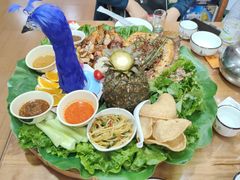 -沐毫傣泐云南菜孔雀宴•手抓饭傣味烧烤(曼听公园店)