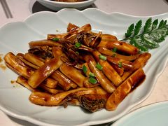 毛蟹炒年糕-卯时·龙光雅宴·精致锡帮菜(惠山古镇店)