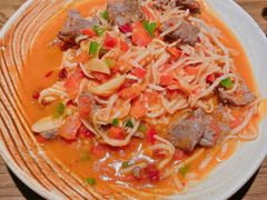 酸笋丝炒牛肉片-金孔雀德宏傣味餐馆(魏公村店)