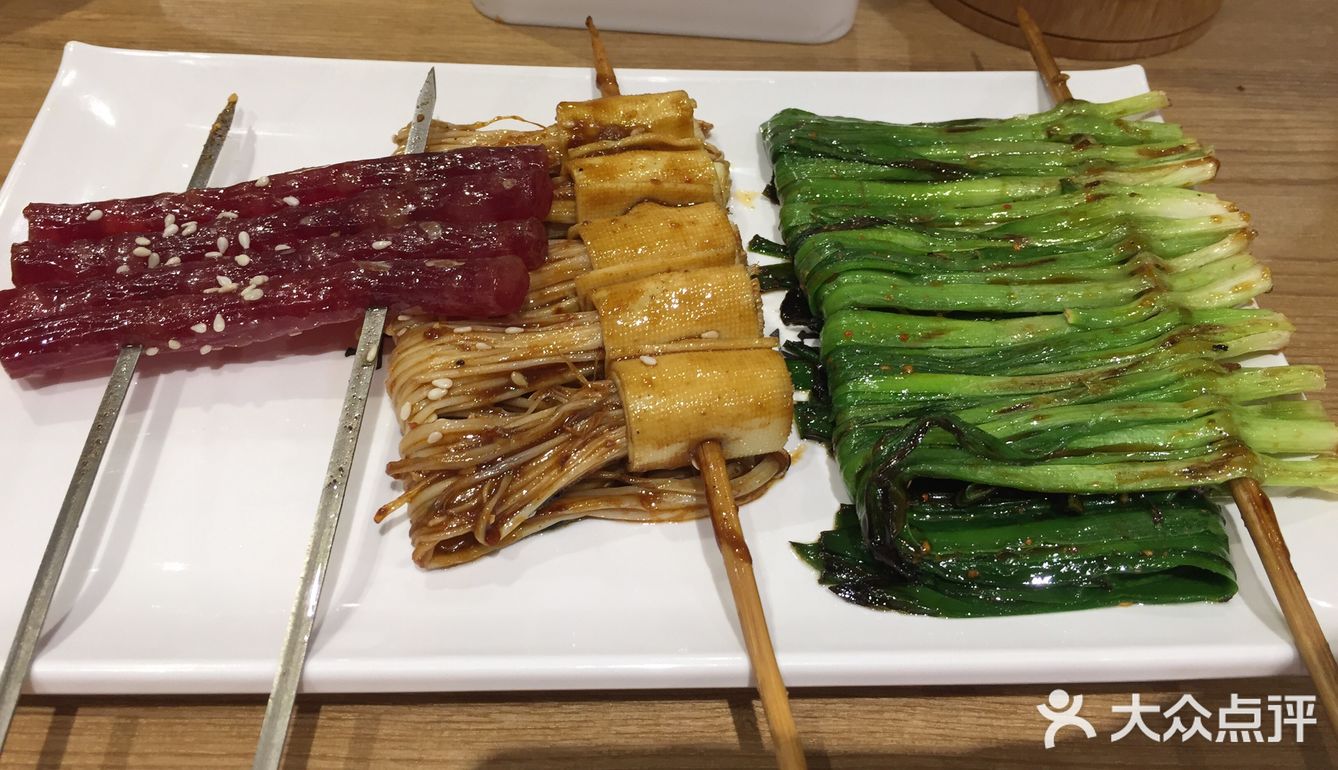 没想到他家竟然有，挺大的一条鱿鱼，切成小块块了