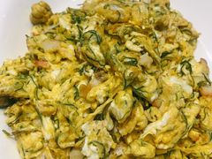 韭黄鸡蛋炒大蛤-添福来墨鱼饺子 · 海鲜东北菜(大连星海·黄浦路店)