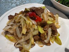 葱爆羊羔肉-巴扎美食·新疆菜·西域歌舞表演餐厅(新疆大厦店)