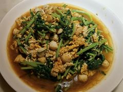 茼蒿炒海蛎子-日丰园海肠水饺·老字号大连海鲜(和平广场店)