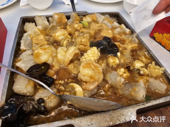 品海楼·大连海胆锅贴馆(东港店)三鲜焖子图片