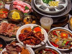 -草家酱蟹炭火烤肉店(珲春南路二店)