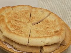 馕坑芝麻馕-巴扎美食·新疆菜·西域歌舞表演餐厅(新疆大厦店)