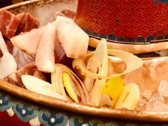 -毛辣果·贵州红酸汤牛肉火锅(西单店)