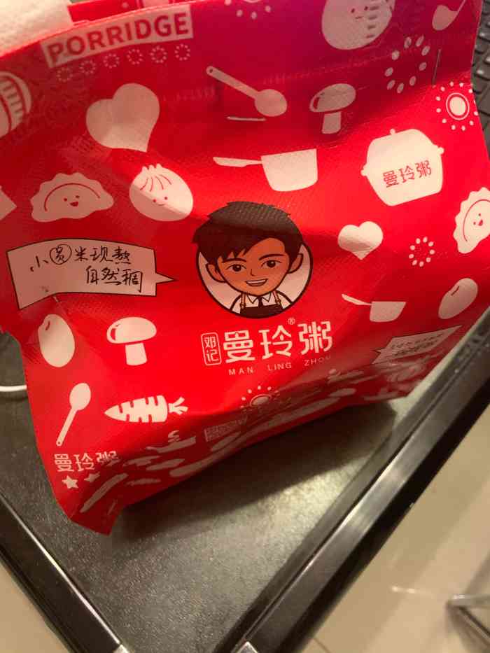 了曼玲粥店,那几天真的天天喝粥不见荤腥啊~  最喜欢的是曼玲家的袋子