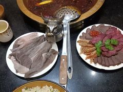 -周老三跷脚牛肉·全牛火锅(非遗传承店)