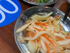 -明何记涮牛肚(品牌首店隋唐植物园南门古城路店)