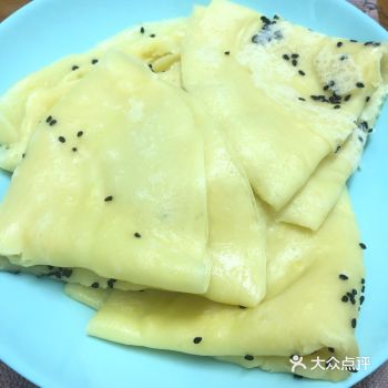 锅刷油开煎、撒上芝麻、起锅、图二