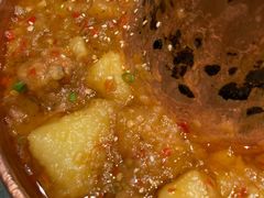 土司铜锅油焖鸡-浩海火烧云傣家菜(京广店)