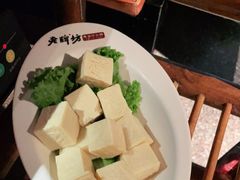 -老牌坊云南鱼豆花火锅(哈西万达店)