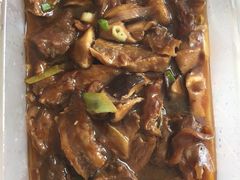 焖牛肉-人民公社铁锅炖·东北菜(卫国道店)
