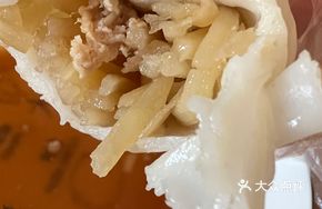 Potato Shreds with Pork Wrapped in Rice Cake