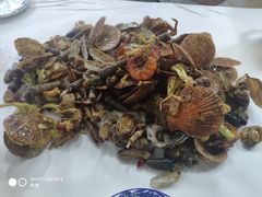 满满一大桌子海鲜-1910老鲁味海鲜·戳子肉·青岛菜(金沙滩店)