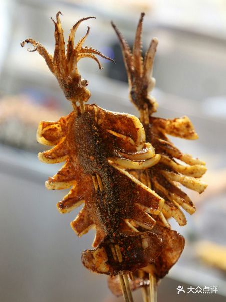阿拉提羊肉串大王(金门店)烤鱿鱼图片 - 第1张