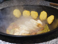 贴饼子-山里屯铁锅炖(哈尔滨中央大街店)