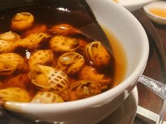 古越陈酿煮花螺-杭州西子湖四季酒店·金沙厅