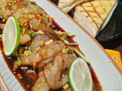-曼听小寨海鲜烧烤·大连辣炒大王(盖州街店)