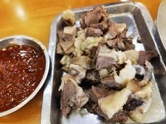 狗脊骨-春明狗肉馆(园丁花园店)