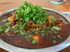 萝卜烧牛肉-周老五跷脚牛肉(民营路店)