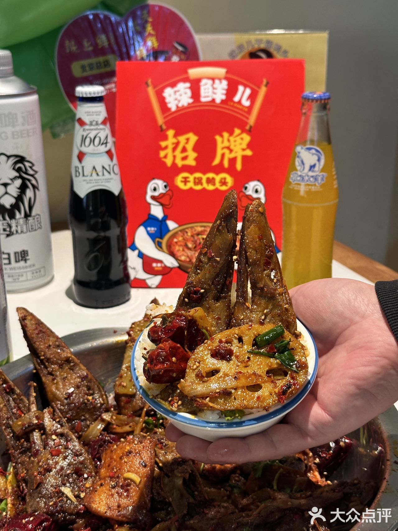 朝阳区东环国际大厦一层南门前去品尝一番