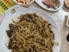 湿炒牛河-华威达牛庄(黄埔大道西店)