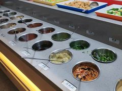-明何记涮牛肚(品牌首店隋唐植物园南门古城路店)