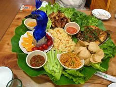 -沐毫傣泐云南菜孔雀宴•手抓饭傣味烧烤(曼听公园店)