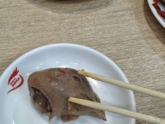 -梁老三麻辣鸡头总店