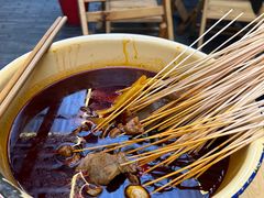 -拈签一笑黄牛肉辣卤串串