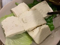 -茅草房·河畔园林火锅