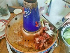 -毛辣果·贵州红酸汤牛肉火锅(西单店)