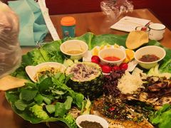 -沐毫傣泐云南菜孔雀宴•手抓饭傣味烧烤(曼听公园店)