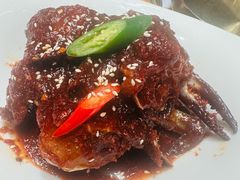 草家招牌酱辣蟹-草家酱蟹炭火烤肉店(珲春南路一店)