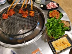 -彝人部落火盆烧烤(原内环足球场店)