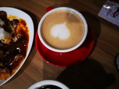 咖啡拿铁-百年朱苦拉咖啡(博物馆店)