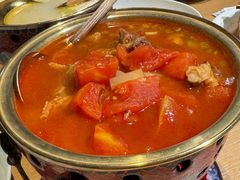 西红柿炖牛腩-关东小磨东北菜(上海长风大悦城店)