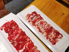 -明何记涮牛肚(品牌首店隋唐植物园南门古城路店)