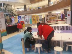 签到处的互动区域-蕃茄田艺术(普陀长风大悦城中心)