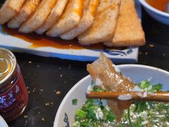 糍粑-茅草房·河畔园林火锅