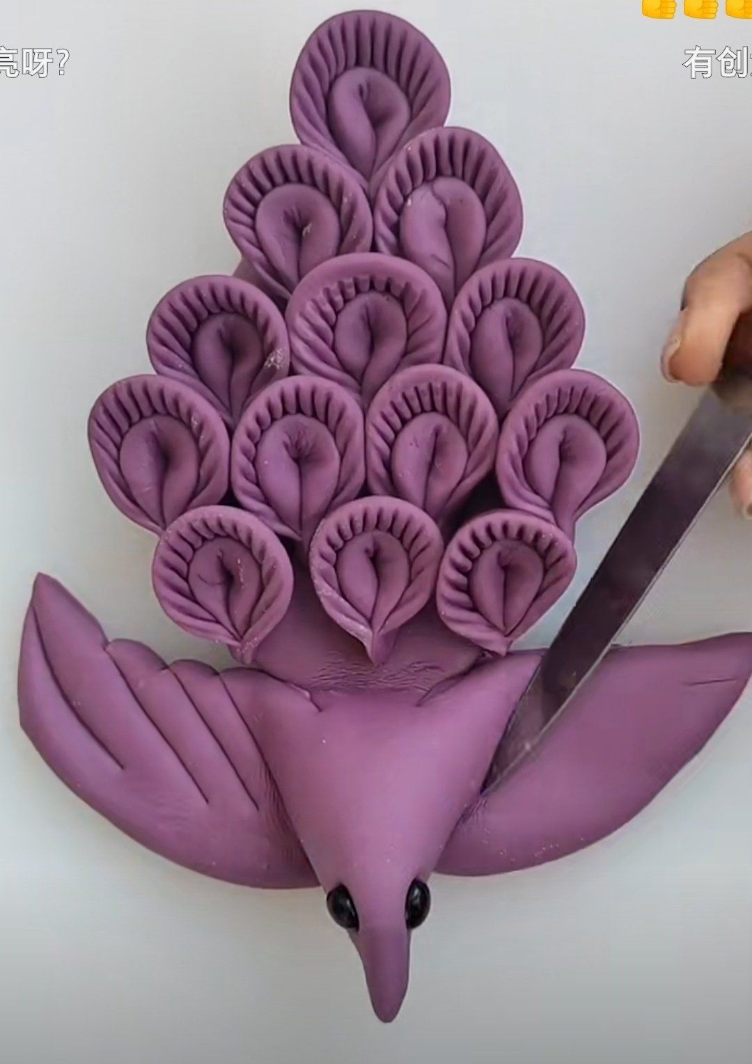 花样面食,我有一个朋友自己在家做的,像孔雀开屏一样.