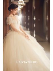 -雪中彩影婚纱摄影·微光艺术中心