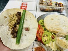-喜悦小串丹东小黄牛海鲜烧烤大排档(民主广场店)